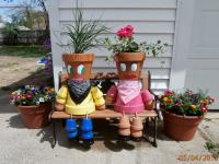 These are a flower pot couple I made for my mother. Do you like them?