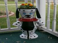 This is a flower pot dog I made for my front porch. Do you like it?