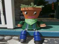 This is a flower pot boy I made for my front porch. Do you like him?