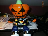 This is a pumpkin head flower pot I made for Halloween. Do you like it?