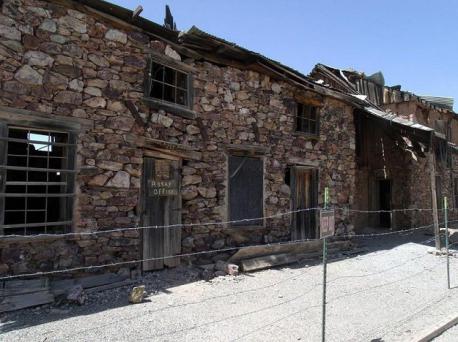 Ghost towns are common in mining or old mill town areas in the United States (image: 1881 Assay building in what was once Vulture City, a mining town in Wickenburg, Arizona, USA). Which States are you familiar with that have mining or old mill ghost towns?