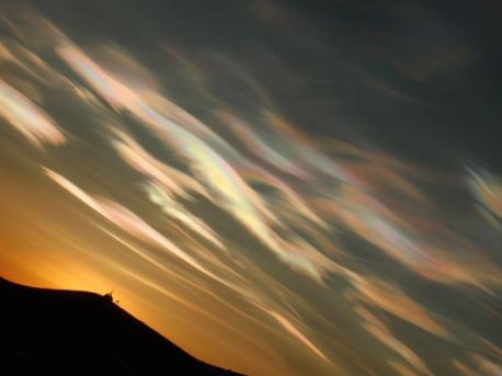 Nacreous Clouds: Usually spotted only near the poles, nacreous clouds form very high in the atmosphere (twice as high as commercial airplanes fly), where the air is particularly cold and dry. The colorful shine actually comes from the setting sun being lower in the sky than the clouds, so they reflect sunbeams back toward Earth. Unfortunately, while they're beautiful, nacreous clouds also destroy ozone, the compound that protects us from the sun's most dangerous rays. Were you aware that the nacreous clouds could destroy the ozone?