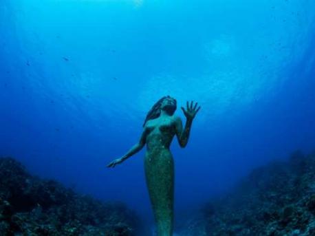 Amphitrite statue, Grand Cayman, Cayman Islands: If you ever want to come face-to-face with a mermaid, consider booking your next vacation to Grand Cayman. One of the island's quirkiest attractions is a ghostly mermaid statue sitting in 50 feet of water off the coast of the beach, where she has been chilling since 2000. The 9-foot-tall, 600-pound sculpture is based off of Amphitrite, goddess of the sea and wife of Poseidon in Greek mythology. If you ever get a chance to visit the Cayman Islands would you like to see this ghostly mermaid statue?