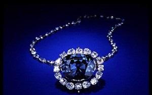 The Hope Diamond: This diamond is surrounded by legend and history. Some believed that this huge, deep-blue diamond, which came from India, was cursed and would bring bad luck or even death to its wearer. The first famous owner of the Hope Diamond was Louis XIV, the King of France. He bought the diamond from a French gem merchant named Jean Baptiste Tavernier, and its initial size was a staggering 112 3/16 carats. Louis chose to have the stone cut down to 67 1/8 carats, for use in the French Crown Jewels. The second owner was the next King of France, Louis XV, who reset the diamond in another royal jewelry piece, the Emblem of the Golden Fleece. During the French Revolution, the diamond was stolen during the looting and it did not surface again for 20 years. In 1812, the diamond reappeared in England under mysterious circumstances, and was snapped up by a wealthy collector, Philip Henry Hope. It remained in his family until it was sold again, and for years afterward, the Hope Diamond bounced back and forth between collectors. Evelyn Walsh Mclean purchased the diamond in 1912: again, it was reduced and re-cut, this time to 45.52 carats, to suit Walsh's taste. She relished tales of the Hope Diamond curse, even thought they were unfounded, as it pleased her to own such a notorious gem. She was rumored to keep the stone within the cushions of her sofa as a hiding place. After her passing, the famed jeweler Harry Winston bought the Hope Diamond and donated it to the Smithsonian Museum, and, from its origins deep with the earth of India, over a billion years ago, it now belongs to the American people. Are you familiar with these facts for the Hope Diamond (the most notorious diamond ever)?