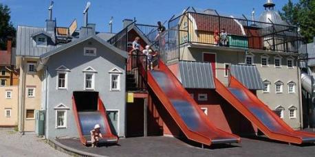 Astrid Lindgren's World, Vimmerby, Sweden: Inspired by the stories of Swedish author Astrid Lindgren (who's best known for writing Pippi Longstocking) this theme park is full of whimsical details, including these slides built into the rooftops of a tiny village. If you have (younger) children would you let them ride this rooftop slide?