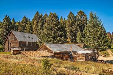 Garnet, Montana: Garnet was born during the gold rush of 1895 and home to nearly a thousand miners and homesteaders at its peak. The mines were quickly depleted and most people were gone by 1912, but two dozen wood buildings persist, making this one of the best-preserved mining towns in the U.S. It looks almost like a movie set for an Old West boom-town. Today it is owned and managed by the U.S. Bureau of Land Management. Volunteers recruited to maintain the site give $3 tours and get free lodging in a rustic Garnet cabin, as well as a small stipend. Beware, though: They report paranormal sightings and unearthly noises in the night. Have you ever visited (or lived in) Garnet, Montana?