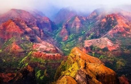 Nāpali Coast State Wilderness Park, Hawaii: The rugged red and green rocks of Hawaii's Nāpali Coast State Wilderness Park look more suited to Mars than Earth. 'Na Pali' means 'high cliffs', and the tallest mountains here soar to 4,000 feet. The best way to take in the prismatic peaks is from the Kalalau Trail, a hardy, 11-mile route that rewards its hikers with a sandy beach at the end. The trail is currently closed (due to damage caused by flooding), but you can check the trail site for details of its reopening. When the trail reopens, will you visit the Nāpali Coast State Wilderness Park?