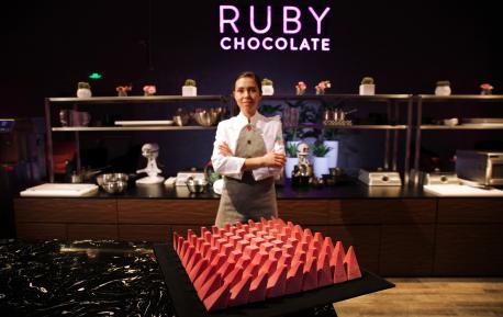 The new variant is derived from ruby cocoa beans, which are found in Ecuador, Brazil and the Ivory Coast. Ruby has no added colors or flavorings, and has a sweet and sour taste that's distinctive from the bitter, milky or sweet profiles of other chocolates. Ruby made its global debut more than a year ago, when Japanese customers first bit into pink KitKats. Berry-hued bars, doughnuts and biscuits soon followed in Europe, Australia and New Zealand. It's now made its way into the crucial U.S. chocolate market, which at $22 billion is the world's largest. Americans devoured an estimated 9.5 pounds, per capita, last year. Have you ever tried the ruby chocolate?