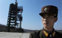 How should the U.S. respond if North Korea launches the Unha-3 rocket?