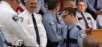 In June 2015, Sam Hesla was sworn in as a reserve officer in the Minneapolis Police Reserves. Hesla, 25, is one of the first reserve officers with Down Syndrome to serve in the country. Before earning his title, Hesla completed 12 weeks of training in which he mastered skills like radio communication, CPR and traffic directing. Though Minneapolis reserve officers don't carry weapons, their duties include crime prevention, monitoring events and backing up the Minneapolis police department when necessary. He says he enjoys helping other people, because