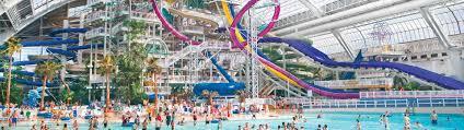 The West Edmonton Mall, in Edmonton, Alberta, Canada, is the largest mall in North America and features the largest indoor water park in North America, with the largest indoor wave pool in the world. The mall has over 800 stores and services and parking for more than 20,000 vehicles. The mall also includes theme areas including: Bourbon Street (New Orleans-styled clubs and restaurants), Europa Boulevard, and Chinatown. The mall has a theme park called Galaxyland which a number of attractions including a roller coaster. In addition, the mall has an indoor lake, which is home to four sea lions and a replica of the Santa Maria. The mall also has a hotel, indoor shooting range, petting zoo, dinner theater, cinemas, four radio stations and an inter-dominational chapel. Have you ever been to this mall?