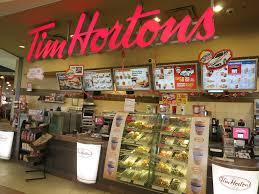 Tim Hortons (no apostrophe grammar police) is a Canadian fast food chain founded in 1964, and now has over 4,613 restaurants in fourteen countries. The company has its headquarters in Oakville, Ontario, Canada. Although it was bought by the American-owned Burger King in 2015, and has many international locations, it is still considered as Canadian as -- well, 