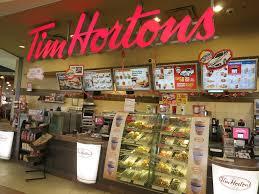 Tim Hortons (no apostrophe grammar police) is a Canadian fast food chain founded in 1964, and now has over 4,613 restaurants in fourteen countries. The company has its headquarters in Oakville, Ontario, Canada. Although it was bought by the American-owned Burger King in 2015, and has many international locations, it is still considered as Canadian as -- well,