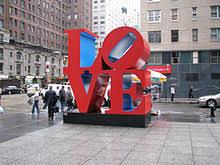 Perhaps one of the most famous sculptures in modern times, the LOVE sculpture, by pop artist Robert Indiana, is also one of the most photographed ones. Prolific throughout the 1960s, the artist, who was born Robert Clark and later took the name of his native state as his own, is widely remembered as the creator of the quadrangular LOVE design — four stacked letters and a tilted 