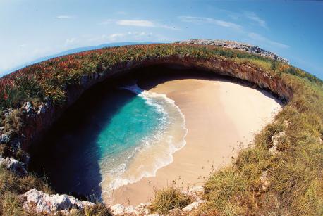 The Hidden beach in Marieta, Mexico is said to have formed after the Mexican government used the uninhabited islands for target practice in the 1900s. No matter how it was formed, it is incredible to see. Have you seen this beach in Mexico?