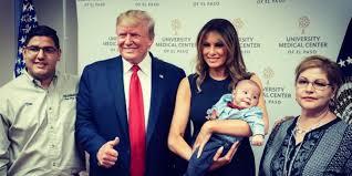 By now, most of us have seen the photo released by First lady Melania Trump of the trip she made with President Donald Trump to visit shooting victims at University Medical Center in El Paso, Texas. One photo where she's holding a baby who was orphaned as a result of the deadly shooting there last week, has been making headlines for all the wrong reasons. In the photo, Melania Trump is holding an infant, who a senior White House official confirms is the son of Jordan Anchondo, 24, and Andre Anchondo, 23, a young couple who were killed in last Saturday's shooting at a Walmart. The President is making a thumbs-up sign next to the first lady and is joined by some of the baby's surviving relatives. What are your thoughts on this photo?