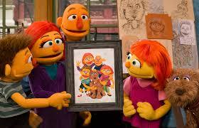 Although the Sesame Street in Communities program has been praised for helping young children, their parents and caregivers, its materials have been criticized. In August, the advocacy group Autistic Self Advocacy Network (ASAN), which is run by autistic individuals, announced it was cutting ties with Sesame Street after the show's communities program aired public service announcements featuring Julia, the first Muppet with autism. The PSAs encourage parents to check out the