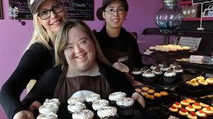Cristina's Tortina Shop was born out of love, and fuelled by the passion to advocate on behalf of those with special needs. The Brampton, Ontario bakery was the brainchild of Mary Iusso, who created the shop for her daughter, Cristina and others with Down Syndrome and other special needs. The idea was to advocate for equal employment opportunities for people with Down syndrome and other special needs - aka. Exceptionalities, in the words of the owner. The shop showcases people's capabilities and even its logo reflects its support for people of all abilities - the logo is of Cristina, and the three cupcakes and 21 polkadots on her apron pay tribute to Trisomy 21 (Down syndrome), says Iusso. Her daughter Cristina has been a huge inspiration for the business, where Iusso hires people with Exceptionalities - like Down Syndrome, Autism, and other special needs - to be a part of her team. Their motto is 