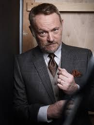 OK, make that two evil geniuses. Jared Harris usually plays eccentric weirdos, villains and people from another time. He is best known for playing Lane Pryce on Mad Men, Russel in Igby Goes Down and Mac McGrath in Mr. Deeds. His credits go far beyond these roles, as he has been on TV in The Other Boleyn Girl (2003), The Riches (2007), Fringe (2008), The Crown (2016), The Terror (2018) and Chernobyl (2019) and in movies, such as The Last of the Mohicans (1992), Natural Born Killers (1994), Smoke (1995), Happiness (1998), How to Kill Your Neighbor's Dog (2000), B. Monkey (1998), Shadow Magic (2000), Mr. Deeds (2002), Resident Evil: Apocalypse (2004) and The Curious Case of Benjamin Button (2008). Although British, one of his best talents is completely adopting a different accent and nailing it. Have you seen him in any of his onscreen roles?