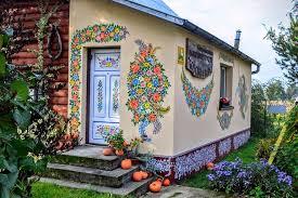 Zalipie, Poland, is a small town of about 750 people, but it makes up for its tiny size with style. According to legend, townspeople started painting beautiful floral motifs on their houses to cover up smoke stains from their wood-burning stoves, and the trend caught on. Now, everything in the town, from houses to chicken coops to bridges is covered in gorgeous paintings of flowers, making it perhaps the prettiest small town in the world. Can you name another small town that is this pretty?