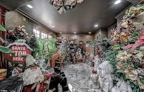 Who doesn't love to decorate for Christmas? Well, some do take it to the extreme. Somewhere buried in all this is a living room. Sometimes less IS best. What do you think of this living room?