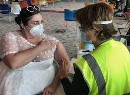 A woman whose wedding reception was cancelled due to the Covid-19 pandemic, made the most of her wedding gown in a unique way. Like many people, Sarah Studley was saddened after her wedding reception was cancelled due to the pandemic. Although she was not able to walk the aisle in her wedding attire, she did not let the dress go to waste. In a post shared by The University of Maryland Medical System, Studley is seen getting her Covid-19 vaccination in Baltimore while wearing her wedding dress. She said that since she couldn't safely go ahead with her wedding plans, this dress represents hope for her future, and for all our futures. Do you think this was a great way to 