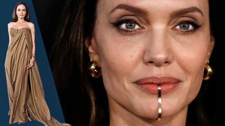 Angelina Jolie caused quite a stir in the fashion world as she walked the red carpet recently at the world premiere of the Marvel film Eternals. Her gown was glamorous, but it was her fashion accessory that caused the controversy -- a chin cuff. The chin cuff clung to her lips and curved around the side of her jaw. Angelina is not the first celebrity to wear a chin piece after it appeared in a Beyonce music video. The piece was designed by Nina Berenato, a Texan jewellery designer and can be purchased for $50. So, what do you think?