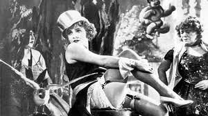 Germany's most famous actress in Hollywood during the 1930s was Marlene Dietrich. When war broke out in Europe, she opposed the Nazi regime and sided with her adopted country, becoming a U.S. citizen in 1941. Though not technically a spy, Dietrich volunteered to help the OSS by producing propaganda radio programs broadcast to Axis countries. Featured in those shows was Dietrich's famous song