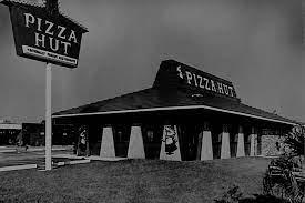 In 1958, two brothers and Wichita State University students, Dan and Frank Carney, borrowed $600 from their mom to open a pizza place near their school campus. With room for only eight letters on the sign, they chose to name it Pizza Hut (if they had more letters maybe it would have been Pizza House?) Did you know that this is the story behind the pizza chain's name?