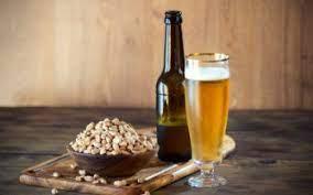 Peanuts and other nuts are often served with beer. While this food combination is popular, you should know that roasted nuts are high in salt and beer has diuretic properties that can cause dehydration. Putting the two together makes it even worse as the salt makes you thirsty, which can lead to you drinking more beer, which can then make you even more dehydrated. If you absolutely have to have a beer with your roasted nuts, make sure you drink plenty of water in between or after your meal. Do you enjoy your beer with roasted nuts?