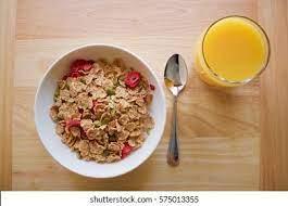 Most breakfast cereals are fortified with vitamins and minerals that are great for your health. Unfortunately, they're not so good when they're eaten with orange juice. Juices such as orange juice contain high amounts of sugar, particularly those that contain added sugar. Combined with sugary cereal, this meal can cause a blood sugar spike that may lead to a crash in energy levels about an hour later. Do you start off your cereal breakfast with a glass of orange juice?