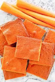 This is my carrot pudding recipe. You will see that the secret ingredient is BABY FOOD CARROTS. I even tried making it with my own ground carrots, and it just did not taste the same. Cream 1/2 cup margarine or butter, with 3/4 cup brown sugar. Add in 1 tbs. vanilla and 1 tbs. lemon juice, 3 jars of baby food carrots, 2 beaten eggs. In separate bowl combine 1/2 tsp baking powder and 1/2 tsp. baking soda with 1 cup flour (I actually use rice flour and it makes it a little more dense). Add the flour mixture to the carrot mixture and mix well. Grease an 8 X 8 inch baking pan well. Bake for 50 minutes at 325 degrees. Take out, cool slightly and cut into pieces (usually 16 total). You can eat right away or reheat later. When ready to eat, put back in 325 degrees oven for half hour or so (until hot). Do you think this is something you'll try?