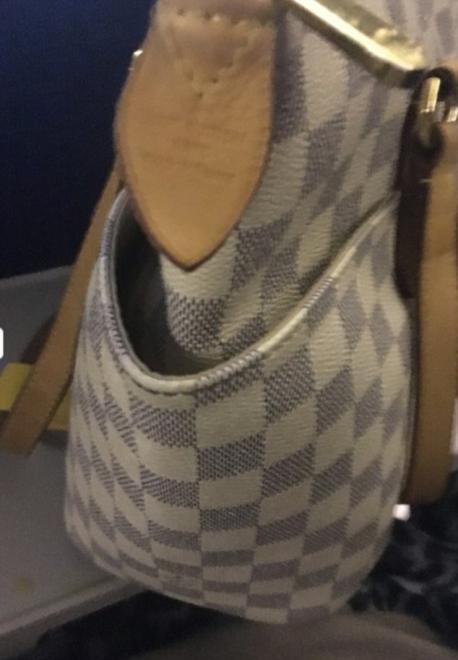 The couple tried to clean it all up quickly, but the lady behind them claims that some of the baby puke pooled under the seat where she had her $900 Louis Vuitton bag. This is where both parties disagree. The purse owner claims she cleaned it off, but the puke smell was now ingrained. The parents (who too pictures) said they could see no damage. After all parties returned home, the parents got an email from purse lady. She said that LV had been unable to get the smell out and they need to replace her purse. If you were the parents of this child, what would you have done?