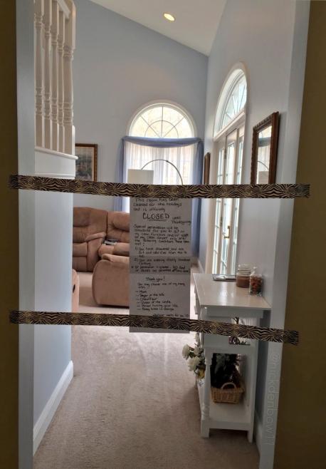 One mom was sick of prepping her house for the holidays, only to have her family undo all of her hard work. So she got a bit creative. Michele Keylor, of Ohio, decided to tape off her living room and officially