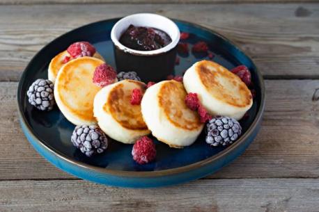 When time allows, many Russian families enjoy an intricate breakfast of syrniki (cottage cheese stuffed dumplings served with jam and sour cream) or blinis (thin Russian pancakes served with sweetened condensed milk, fruit preserves, honey or sour cream). Have you ever visited, worked or lived in Russia?