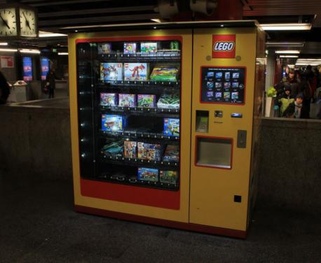 According to hongkiat.com this LEGO vending machine is only found in Germany's train stations. Hey, what's up with that? Don't we all deserve the pain of stepping on LEGO pieces we can't see in the dark of night? The survey question is whether or not you would use the machine to purchase LEGO products?