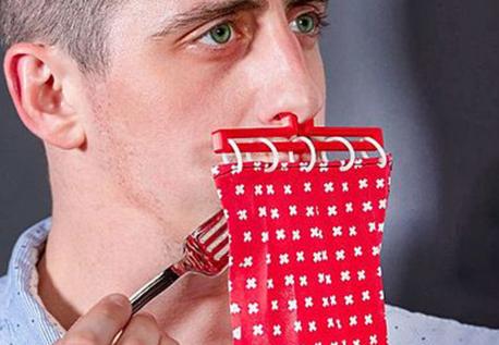 Some people are shy about eating in public. No worries. The Cuisine Drape has got you covered, literally! Pull the curtain and chew to your heart's content. It hangs by your nose so there's nothing to interfere with breathing. Bon Appetit! Would this be an item of interest to you?