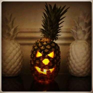 Here is how to make a pineapple jack-o'-lantern. You hollow out the inside, leaving a 1 to 2 inch wall, and add a candle inside. Will you try carving a pineapple jack-o'-lantern this Halloween?