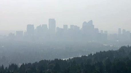 Are there any air quality problems in your town or city? (Picture of forest fire smoke in Calgary, Alberta.)