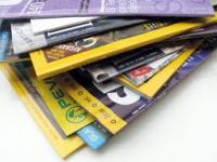 You receive a new magazine in the mail. What is the first thing you do with the magazine?