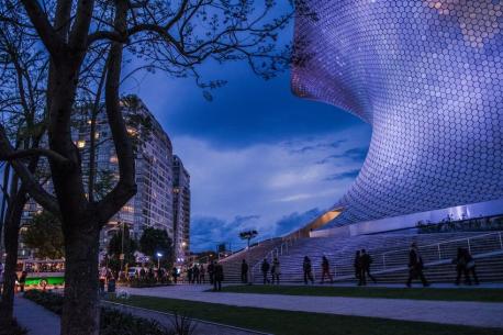 The Museo Soumaya, Mexico City, Mexico - Carlos Slim, the founder, named the museum after his late wife, Soumaya Domit. Designed by Fernando Romero, the building has about 16,000 aluminum hexagons covering the curving surface. The sparkling structural frame has seven rings connecting 28 elliptical columns. The inside has Grecian marble floors and spiraling staircases. You can tour the collection of more than 66,000 pieces of art, including works by Dali, Rodin, Rubens, and Botticelli. It has a collection of about 100 art pieces by renowned artist Rodin. Would you like to visit this amazing architectural design?