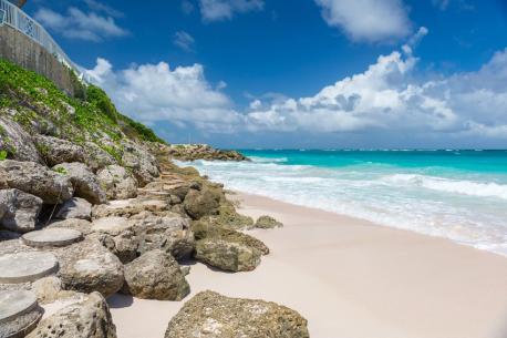 Crane Beach, Barbados - famous <pink> sand beach - The name does not come from the bird, but from a crane used for loading and unloading ships that used to sit on the cliffs above the beach. It is home to a few resorts and has been a favorite for visitors since the late 1800s. Many media outlets consistently rank it as one of the best beaches in the Caribbean and the world. The television show, 