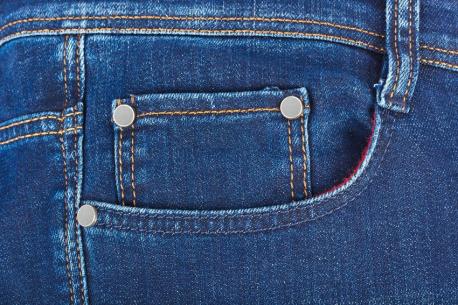 Tiny pocket on jeans - Perhaps you put small change in it, but may tend to forget it even exists. The original purpose was a place to put your watch. Jeans were originally called waist overalls when Levi Strauss & Co. began making them in 1879, and their jeans always had this for pocket watches. They only had three other pockets (one on the back and two on the front) making the watch pocket especially prominent.