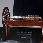 Glass Armonica - an instrument made up of different sized glass bowls that are played with a resonated glove. It works on the same principle as the musical glasses party trick – glass surfaces with different amounts of resistance produce a different pitch when friction is introduced. It is not known who first invented the glass armonica, but Benjamin Franklin built his famous mechanical version in 1761. Are you familiar with this instrument?