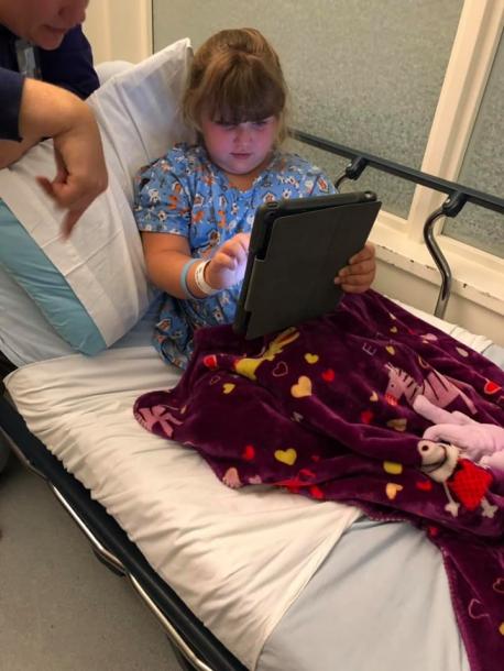 But fear didn't stop the brave little girl. On September 16, Khloe wore a Superman dress to OHSU Doernbecher Children's Hospital in Portland, where she underwent the transplant. Kayla shared a photo of her daughter in a hospital bed that day, writing, 