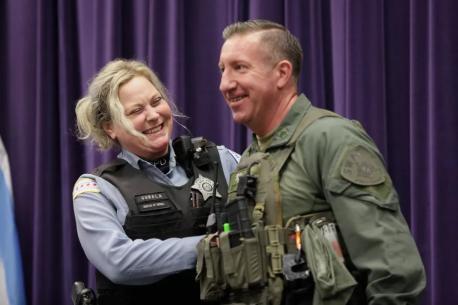 Nowacki had been planning to propose to his girlfriend, Chicago Police Officer Erin Gubala, who was on a post at the finish line - and he didn't let fatigue or the emergency he helped avert deter him. The 19-year police veteran ran right up to his girlfriend. 