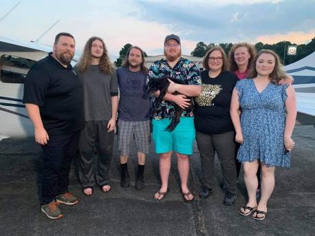 After a stop in Santa Fe and after over 11 hours on the plane, Razzle was back in Arkansas. He was barely able to walk, but he was back in his family's arms. 
