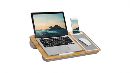 Home Office Lap Desk. Working or studying in bed can be productive as long as you have the right tools. This lap desk has a built-in mouse pad and a slot to hold a smartphone. Useful gift?