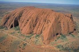 Uluru (Formerly Ayers Rock) Australia. One of the world's most famous forbidden places hasn't been forbidden for that long. In October 2019, Uluru, or the Australian landmark formerly known as Ayers Rock, closed to the public. Climbers had been trekking to the outback for decades just to scale the iconic rock formation. But long before it was a tourist attraction, Uluru was a sacred place to Indigenous groups. Following petitions from the Anangu people, the board of the Uluru-Kata Tjuta National Park finally announced plans in 2017 to ban hikers from the site for good. (You can still visit the area, but climbing the rock is forbidden.) In case that isn't enough to keep people away, there are also rumors of a curse that targets disrespectful tourists. Visitors who have collected rocks from Uluru have reported streaks of bad luck, and enough of the cursed keepsakes have been mailed back to park rangers to earn them the nickname 