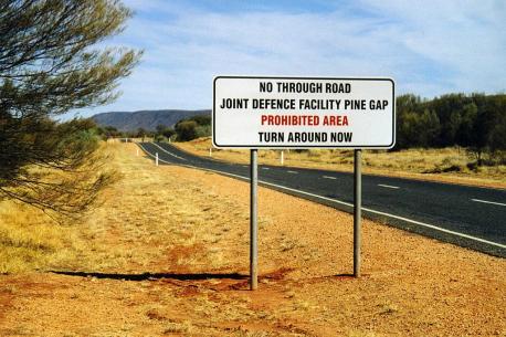 Pine Gap, Australia. The Area 51 one of the land down under. Pine Gap is an American satellite intelligence gathering and signal intelligence surveillance base and Australian Earth station approximately 18 km (11 mi) south-west of the town of Alice Springs, Northern Territory in Australia. Essentially there is not much to say about the place. It's just a regular military base that no one can go to. But would you visit it?